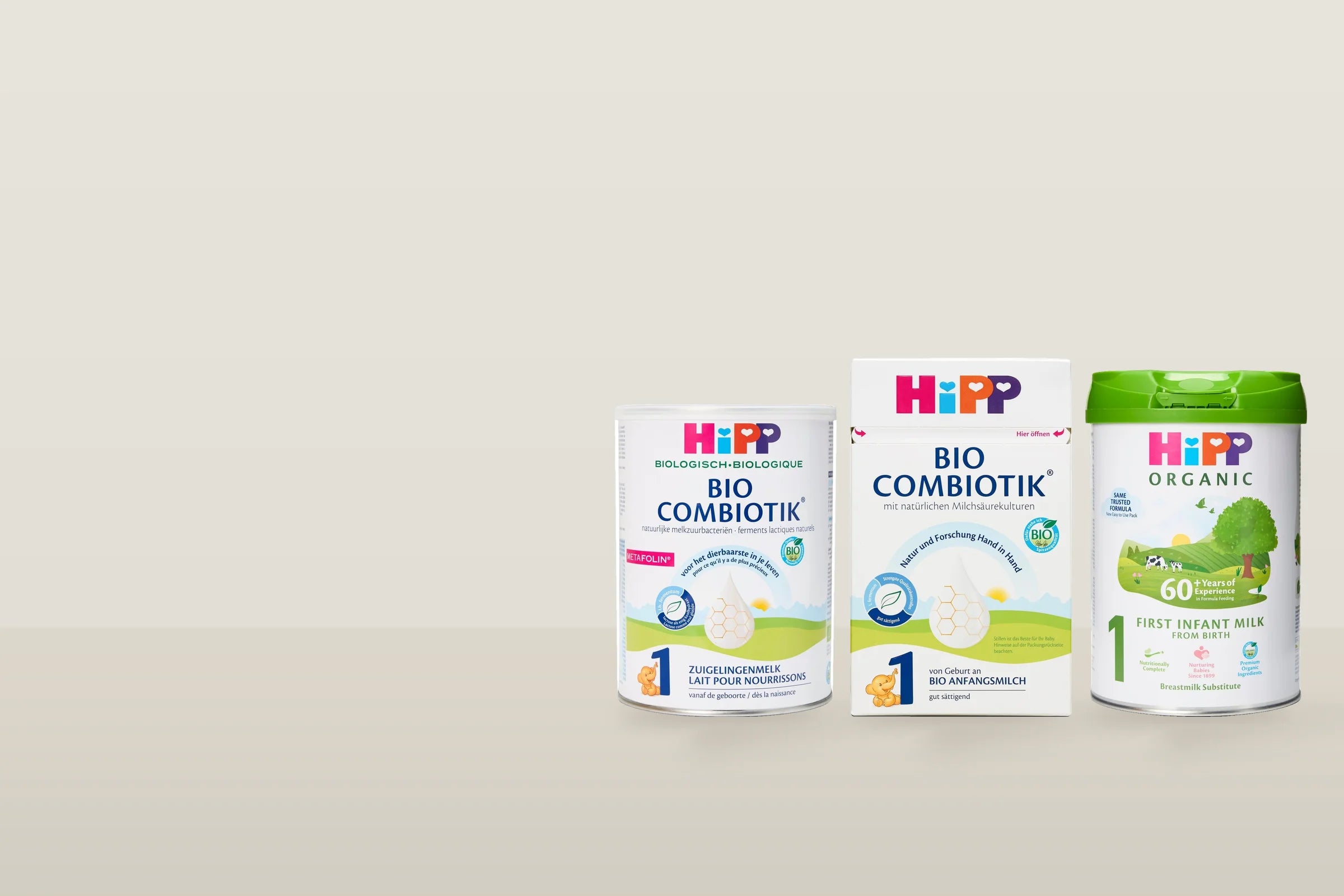 HiPP first infant formula in its Dutch, German and UK editions, side by side